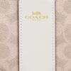 Bolsos de pulsera con cremallera en las esquinas, en Signature Canvas con rayas