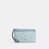 Bolsos de pulsera con doble cremallera y estampado floral