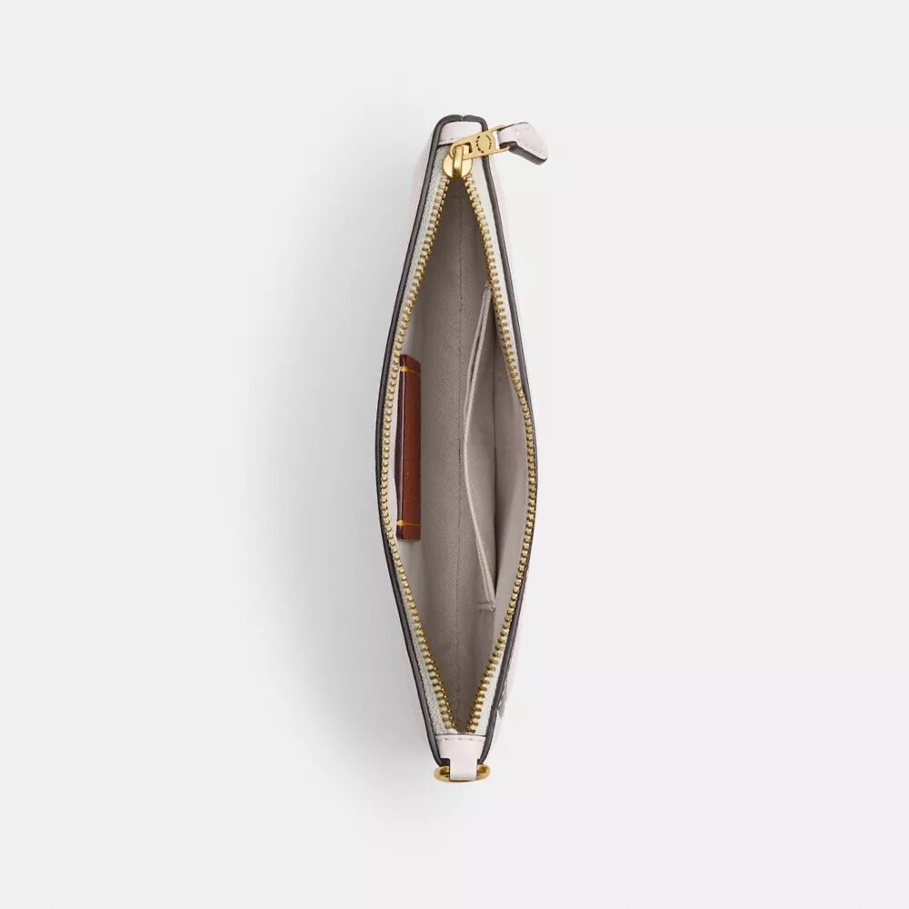 Bolsos de pulsera Essential de Disney X Coach con Pluto