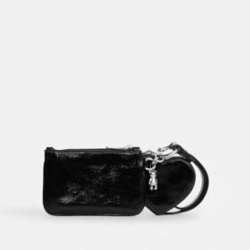 Bolsos de pulsera y neceser en forma de corazón con Charms