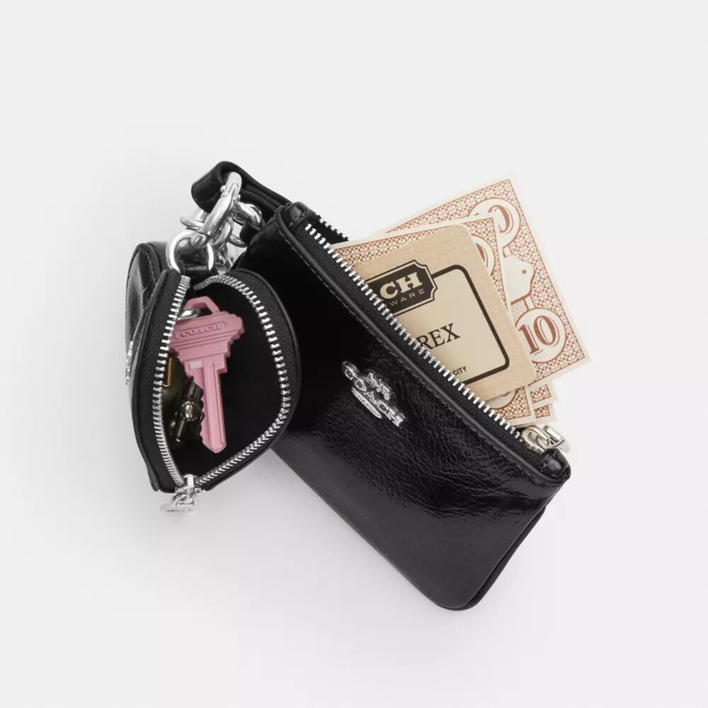 Bolsos de pulsera y neceser en forma de corazón con Charms