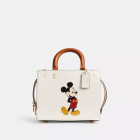 Bolsos Rogue 25 de Disney X Coach con Mickey Mouse