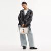 Bolsos Rogue 25 de Disney X Coach con Mickey Mouse