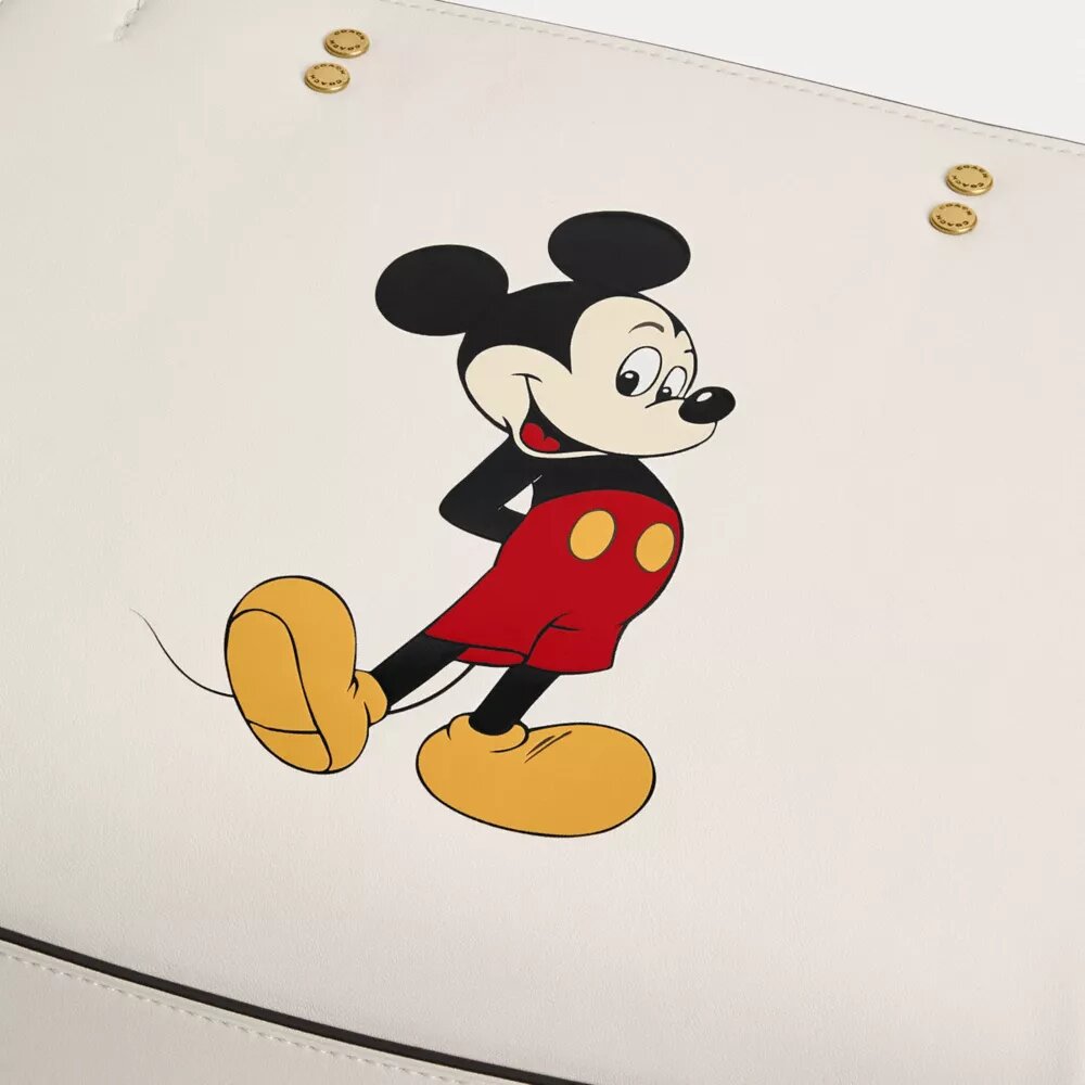 Bolsos Rogue 25 de Disney X Coach con Mickey Mouse