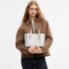 Bolsos Tote Mollie 25 en Signature Canvas