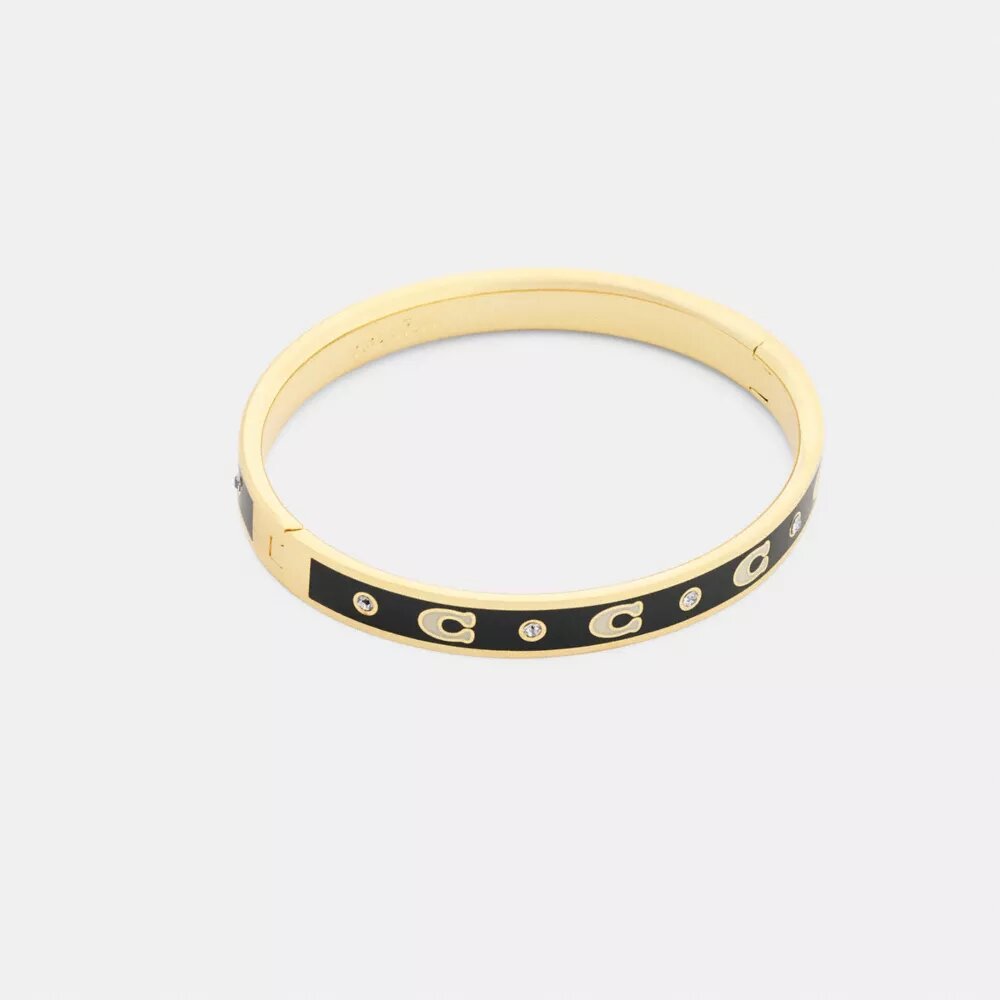 Brazalete con bisagra y letras «C» repetidas