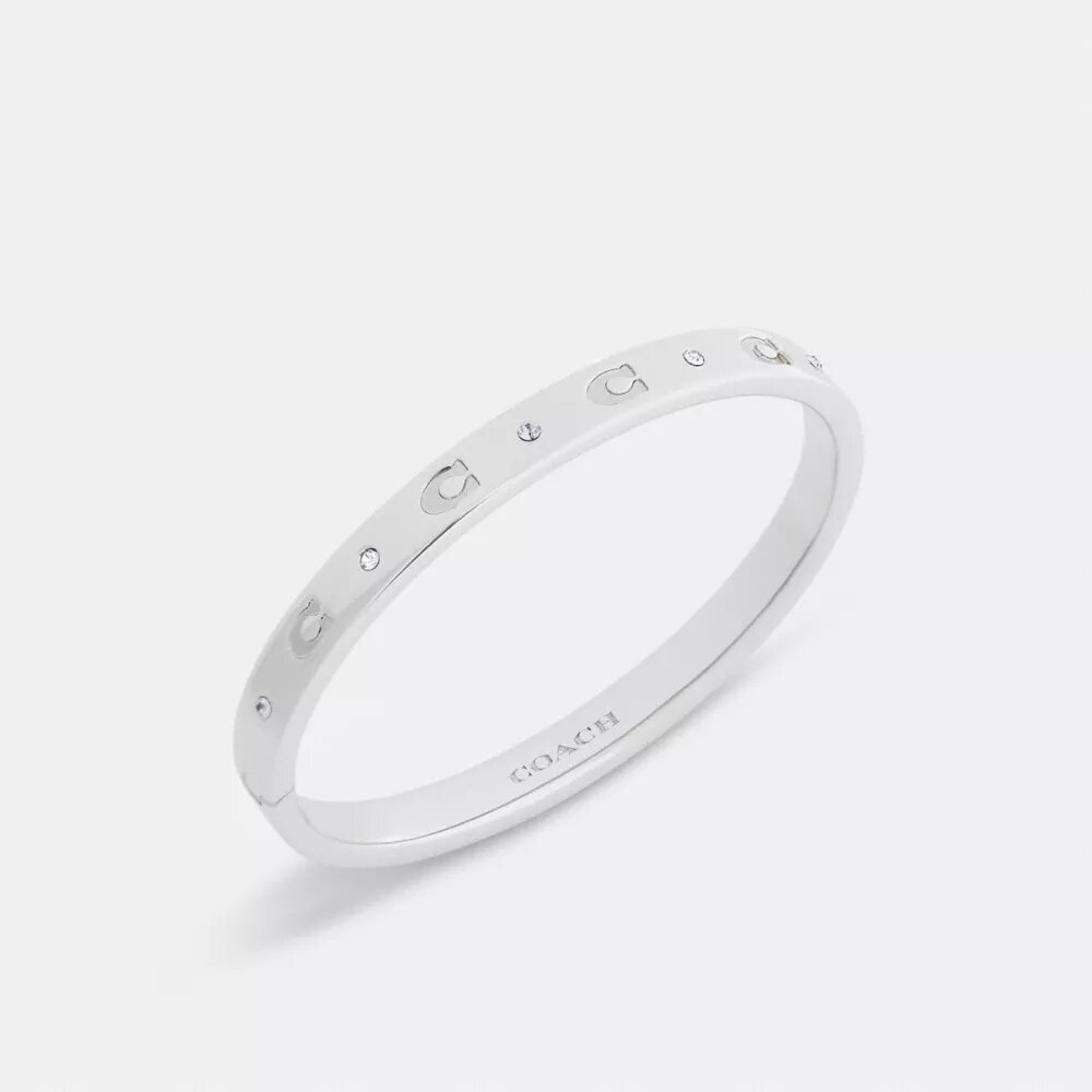 Brazalete con bisagra y letras «C» repetidas