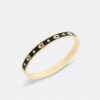 Brazalete con bisagra y letras «C» repetidas