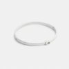 Brazalete fino con bisagra característico
