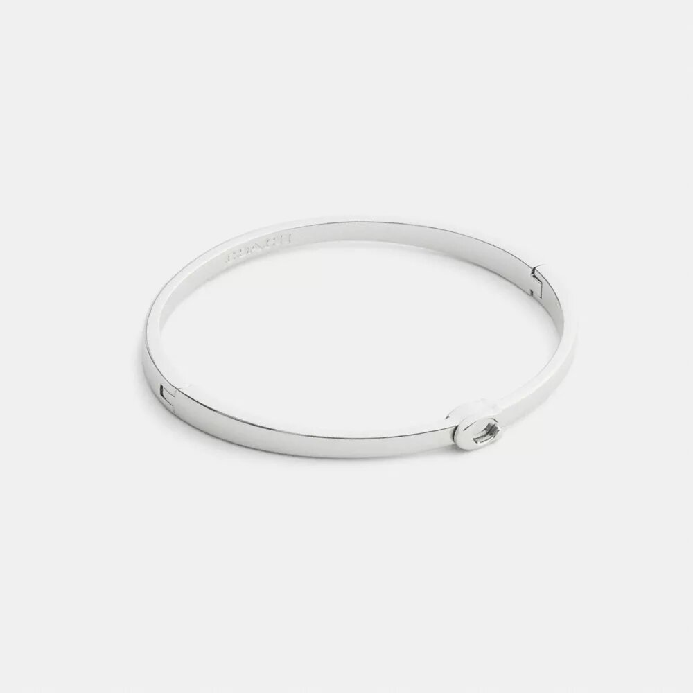 Brazalete fino con bisagra característico