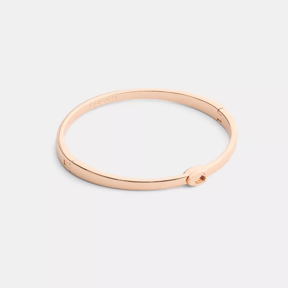 Brazalete fino con bisagra característico