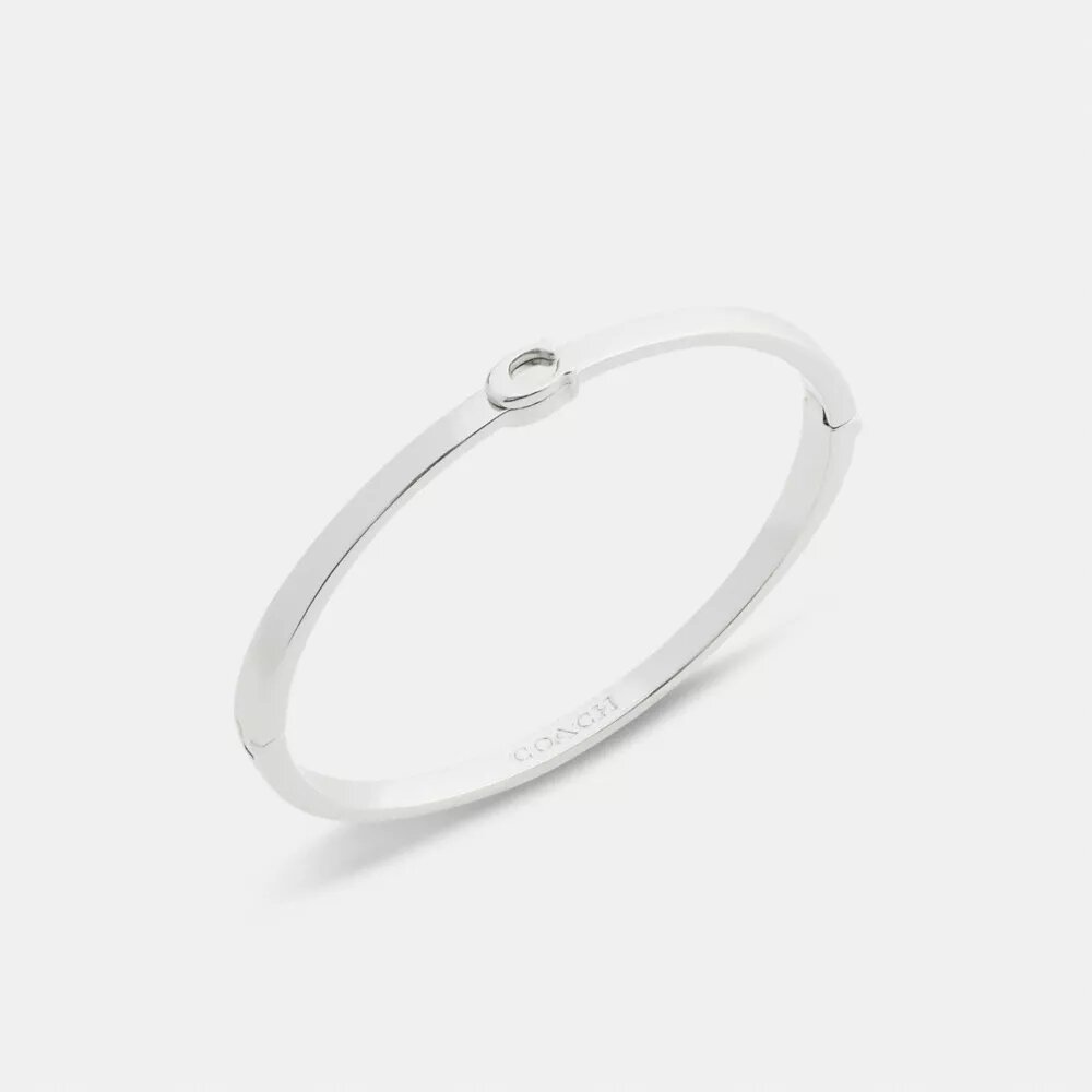 Brazalete fino con bisagra característico