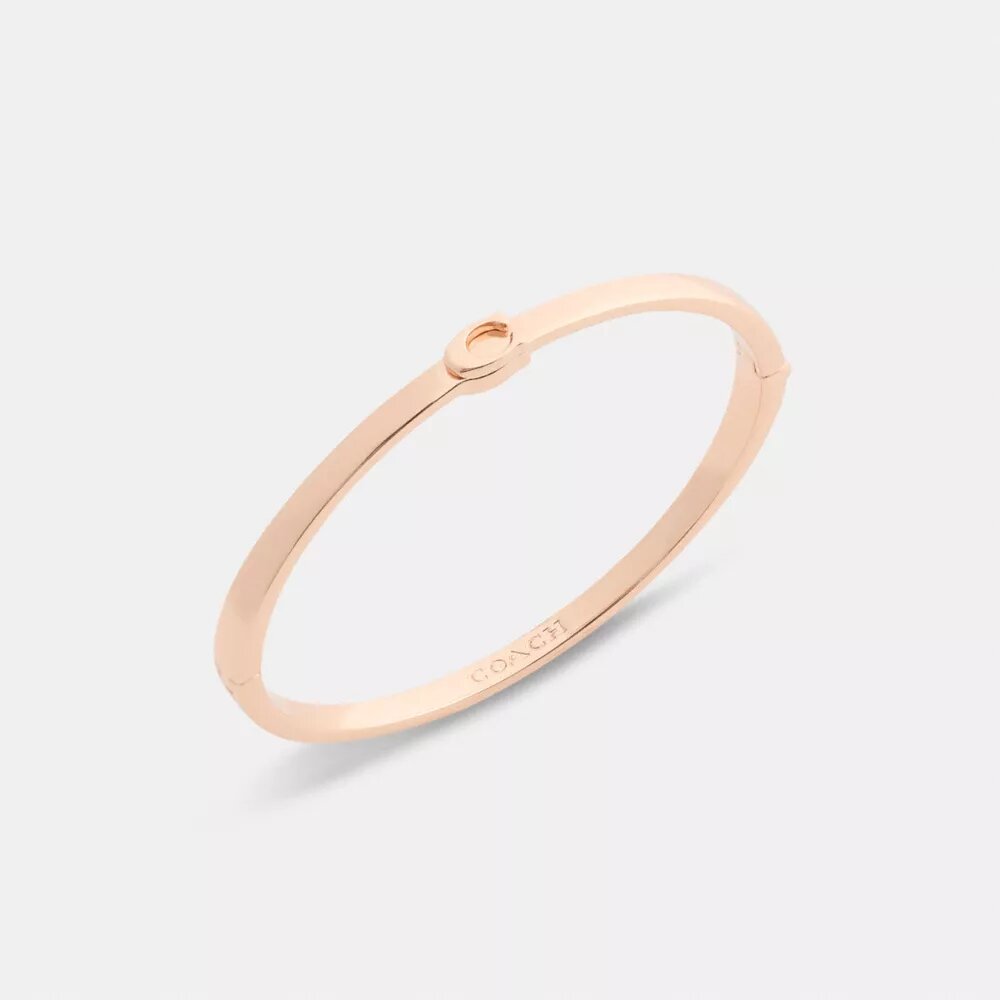 Brazalete fino con bisagra característico