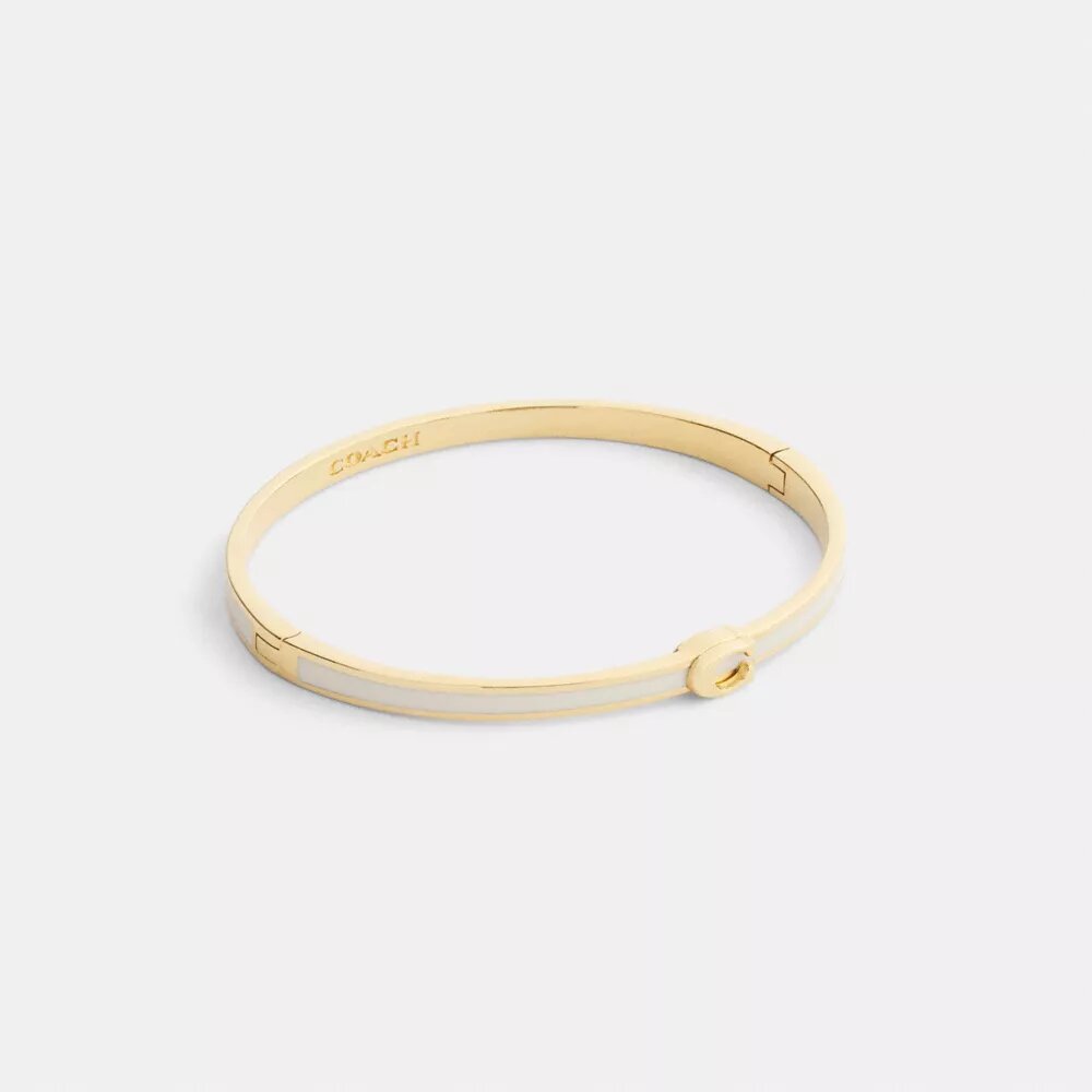 Brazalete fino esmaltado con bisagra y nuestro sello distintivo
