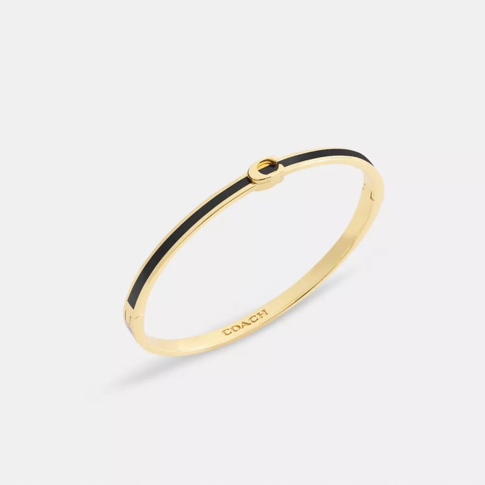 Brazalete fino esmaltado con bisagra y nuestro sello distintivo