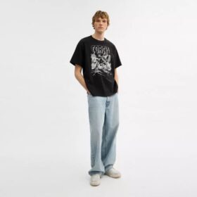 Camiseta holgada «Dinosaur City» de algodón orgánico