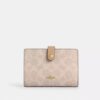 Cartera 2 en 1 en Signature Canvas con estampado en bloques