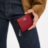 Cartera con cierre a presión