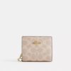 Cartera con cierre a presión en Signature Canvas