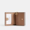 Cartera con cierre a presión en Signature Canvas