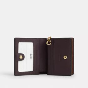 Cartera con cierre a presión en Signature Canvas