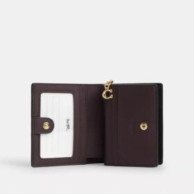 Cartera con cierre a presión en Signature Canvas