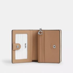 Cartera con cierre a presión en Signature Canvas