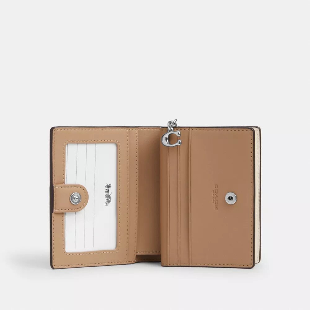 Cartera con cierre a presión en Signature Canvas