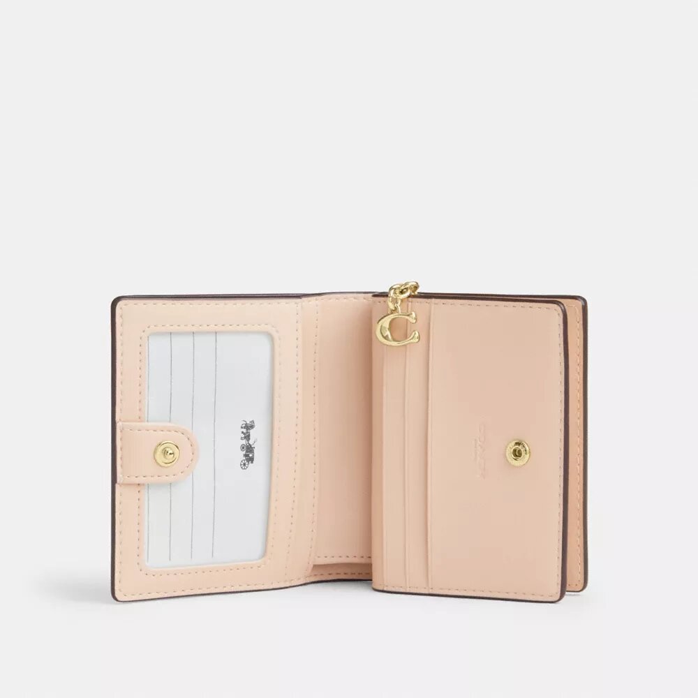 Cartera con cierre a presión en Signature Canvas