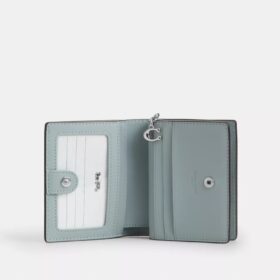 Cartera con cierre a presión en Signature Canvas