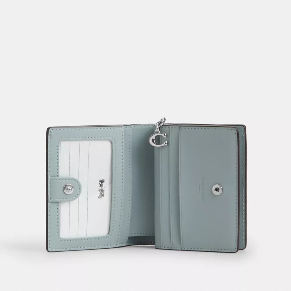 Cartera con cierre a presión en Signature Canvas