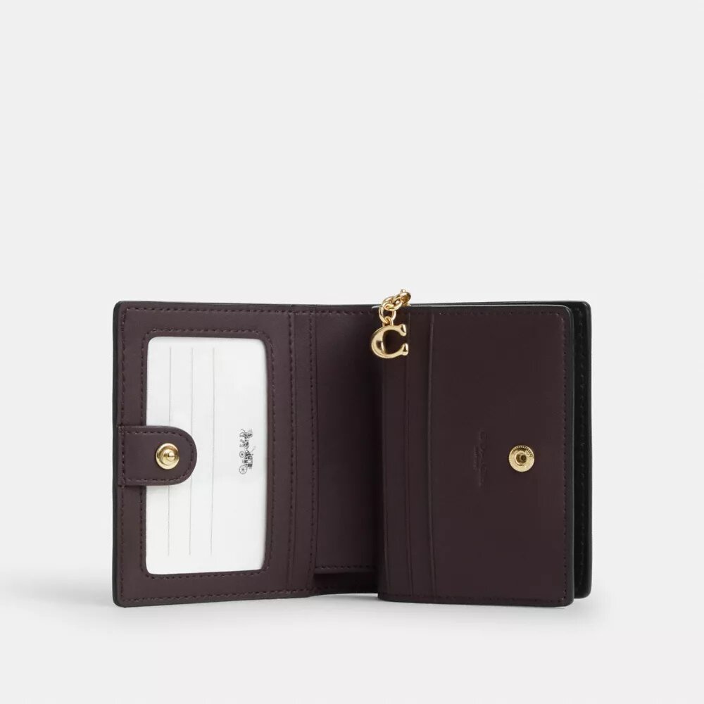 Cartera con cierre a presión en Signature Canvas