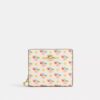 Cartera con cierre a presión, estampado floral y Charms