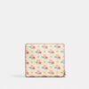 Cartera con cierre a presión, estampado floral y Charms
