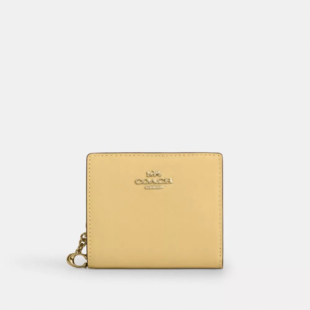 Cartera con cierre a presión y Charms