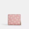 Cartera con cierre a presión y estampado floral
