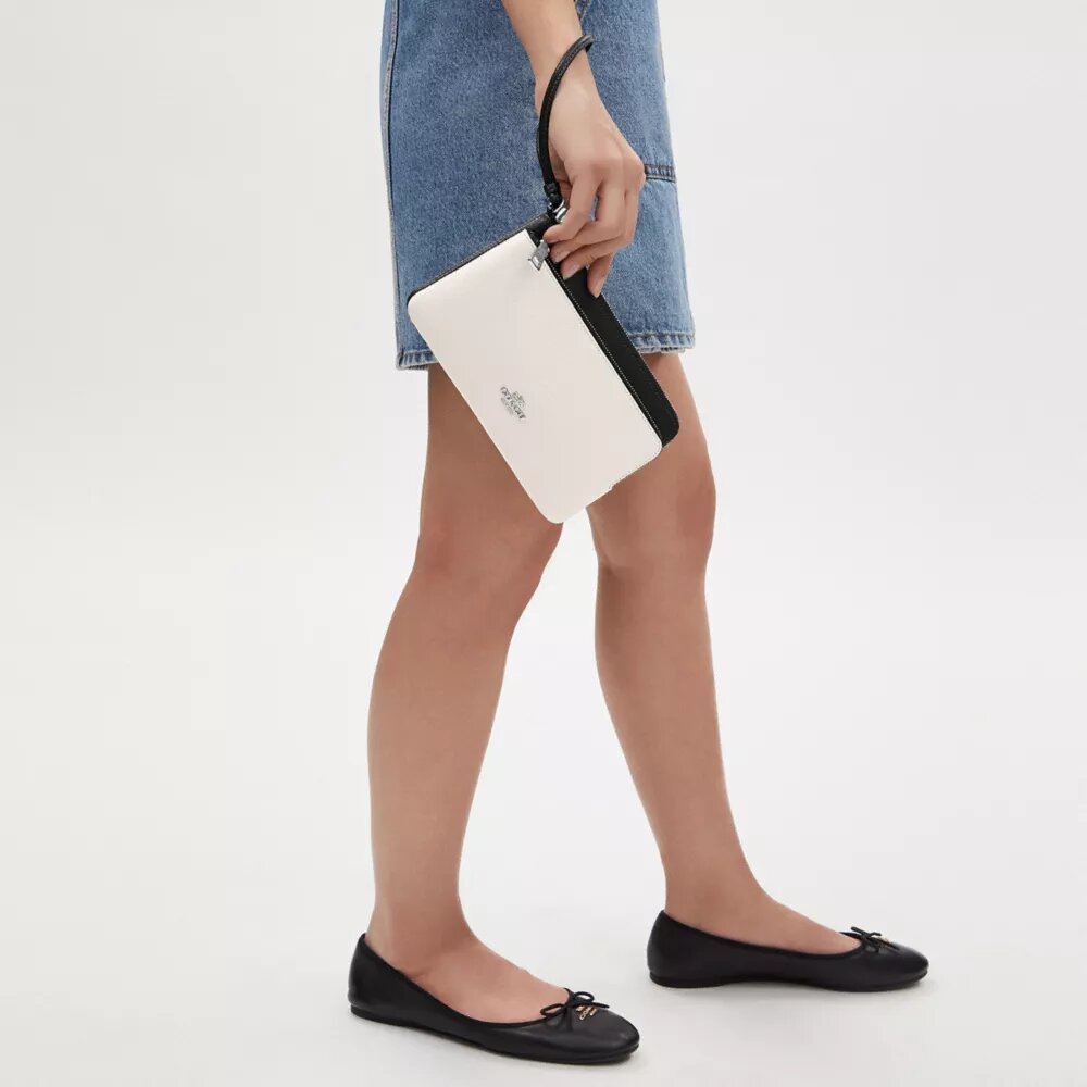 Cartera con doble cremallera