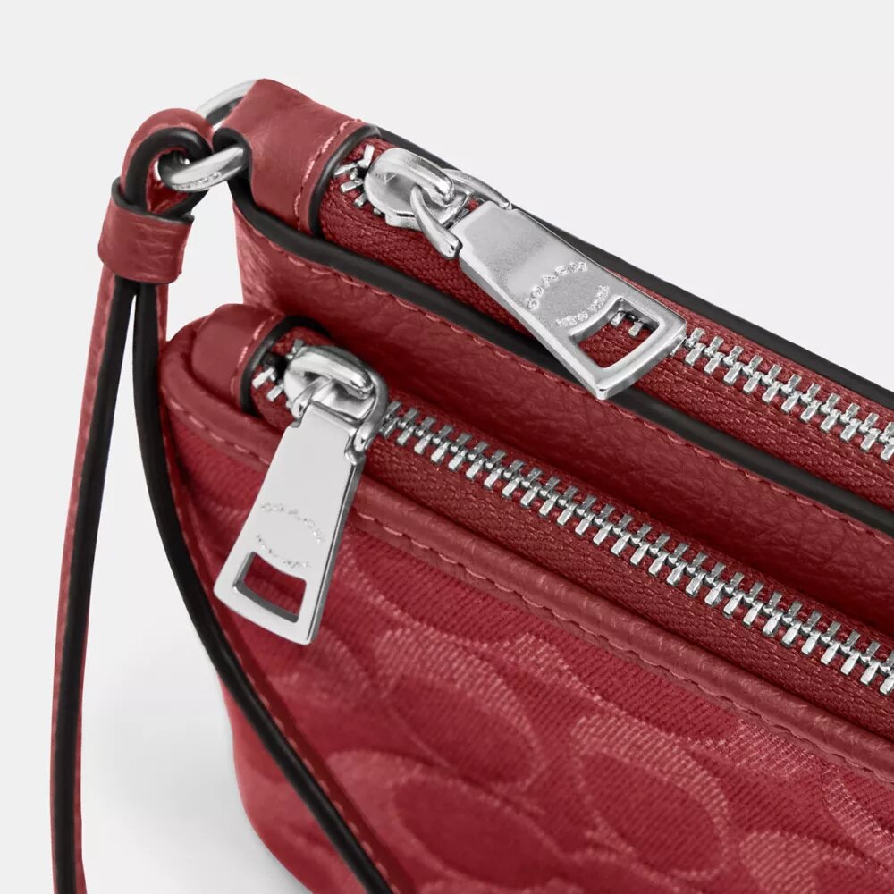 Cartera con doble cremallera en denim exclusivo
