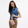 Cartera con doble cremallera en denim exclusivo