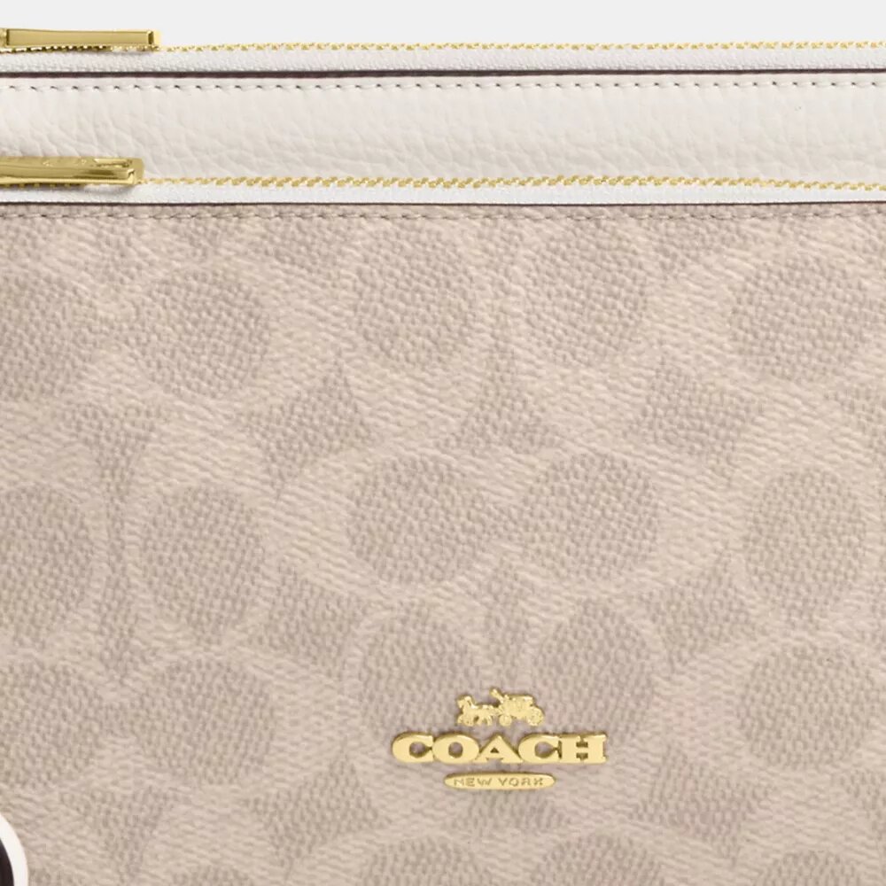 Cartera con doble cremallera en Signature Canvas
