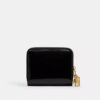 Cartera esencial con Charms