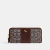 Cartera esencial delgada tipo acordeón con cremallera en nuestro jacquard característico