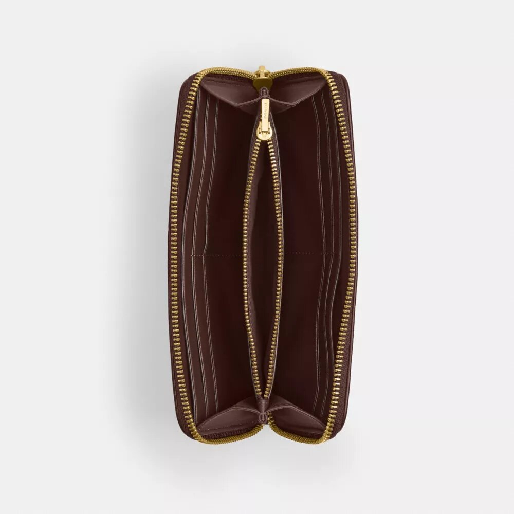 Cartera esencial delgada tipo acordeón con cremallera en nuestro jacquard característico