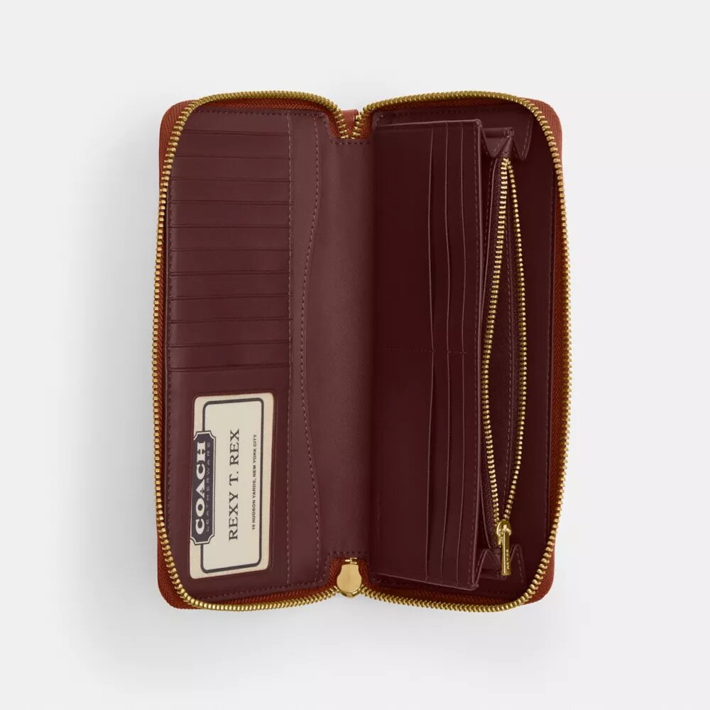 Cartera Essential Continental en Signature Canvas