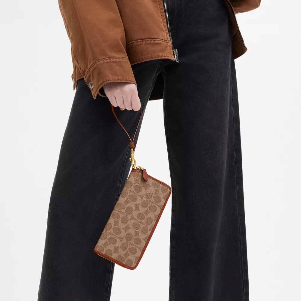 Cartera Essential Continental en Signature Canvas