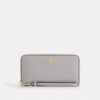 Cartera larga con cremallera envolvente