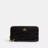 Cartera larga con cremallera envolvente