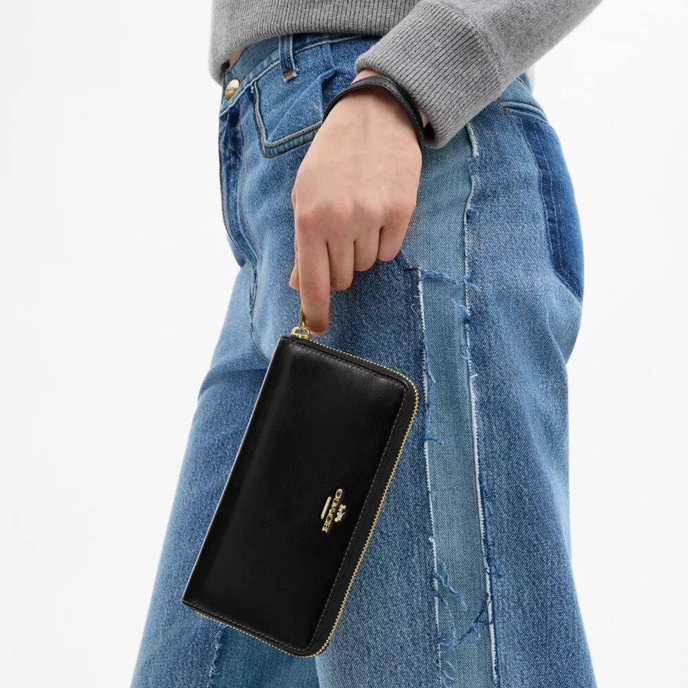 Cartera larga con cremallera envolvente