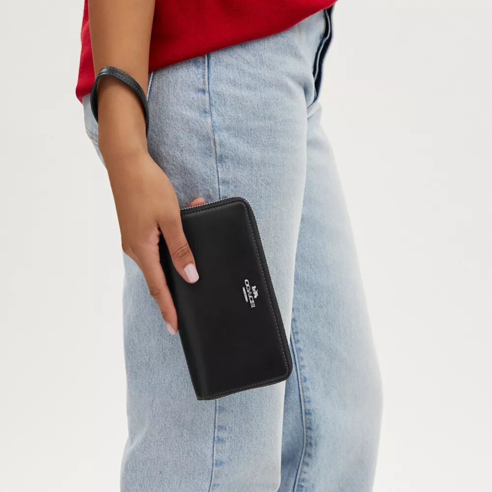 Cartera larga con cremallera envolvente