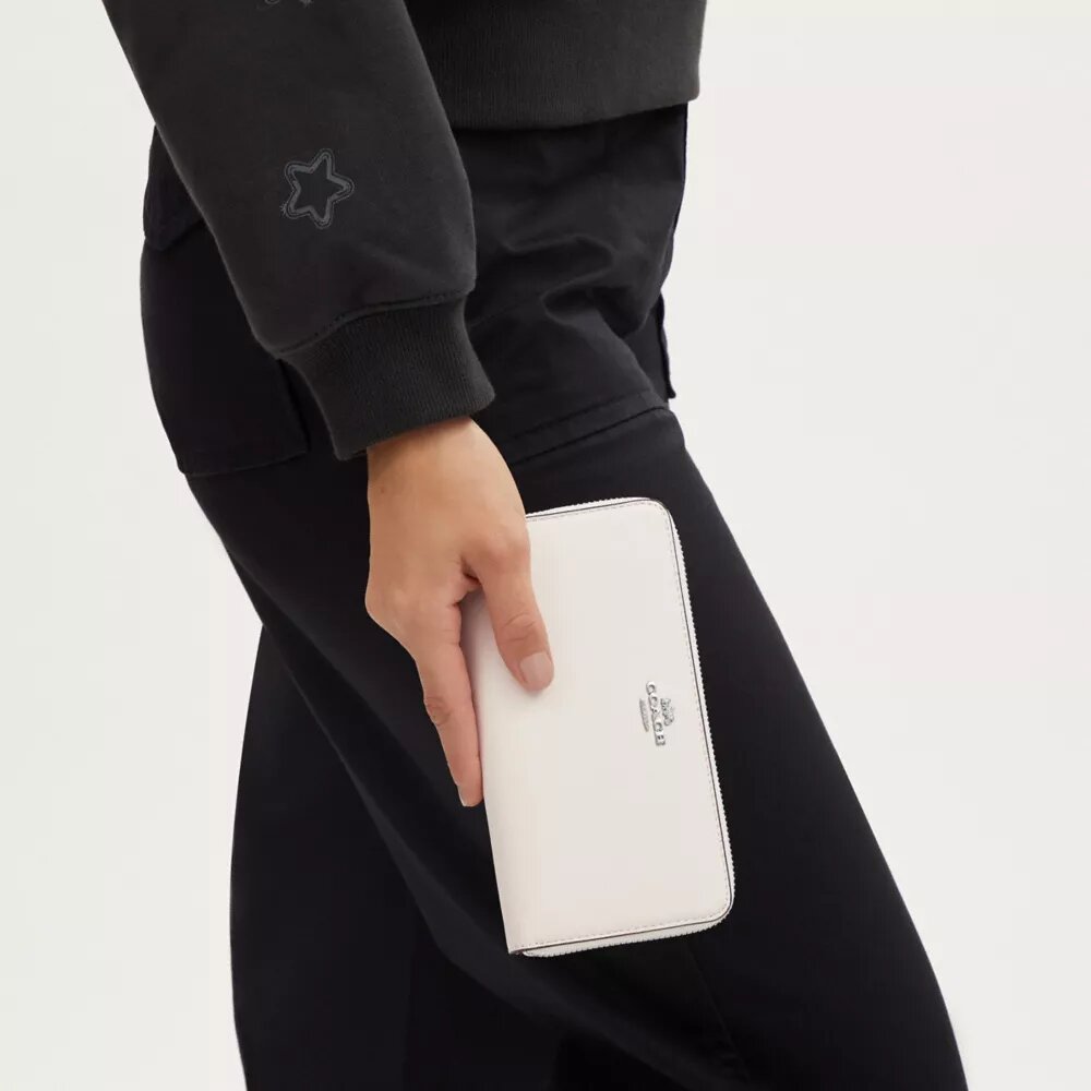 Cartera larga con cremallera envolvente